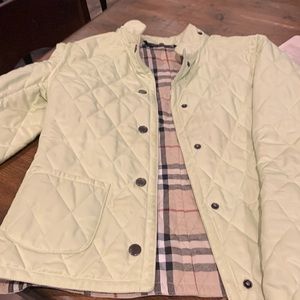 Quilted  Burberry jacket w Burberry check lining.